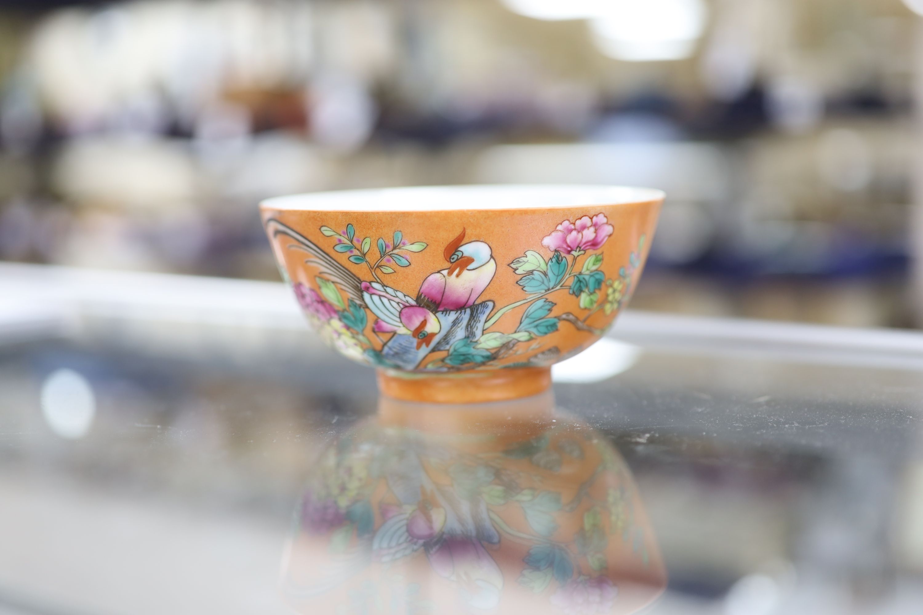 A Chinese orange ground bowl, diameter 11.5cm